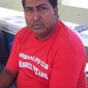 Businessman found dead on kitchen floor with stab wound