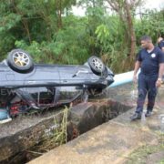 Man’s car washed away in San Fernando flood, fire officers rescue woman