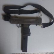 Carenage man shot by police, gun, police kit found